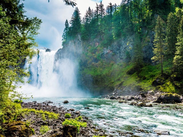 Waterfall and river in Washington forest