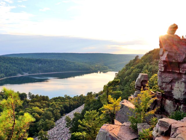 View of Wisconsin lake from mountaintop at sunset