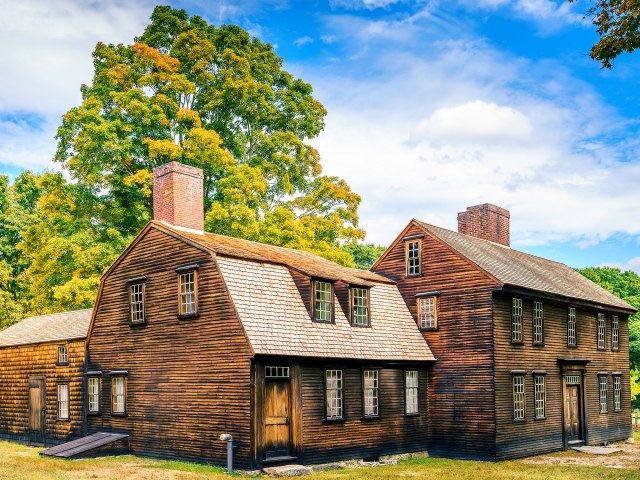 A pair of large, wooden homes 