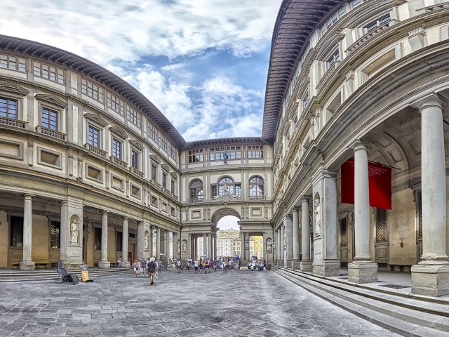 Courtyard with columned walkways in Florence, Italy