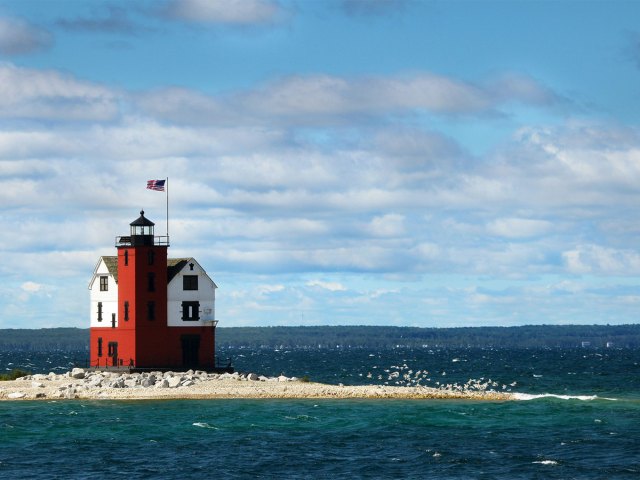 Red-and-white lighthouse on Straits of Mackinac, Michigan