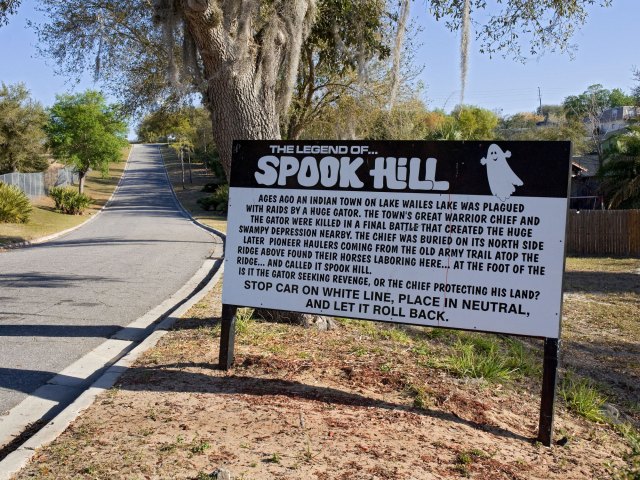 Sign detailing the legend of Florida's Spook Hill