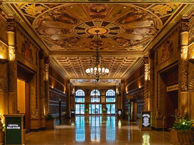 Grand lobby with ornate ceilings at Millennium Biltmore Hotel in Los Angeles