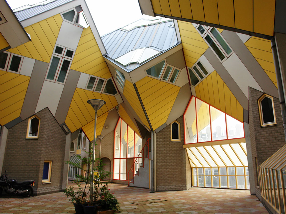 Geometric yellow houses stacked at an angle in Rotterdam, The Netherlands