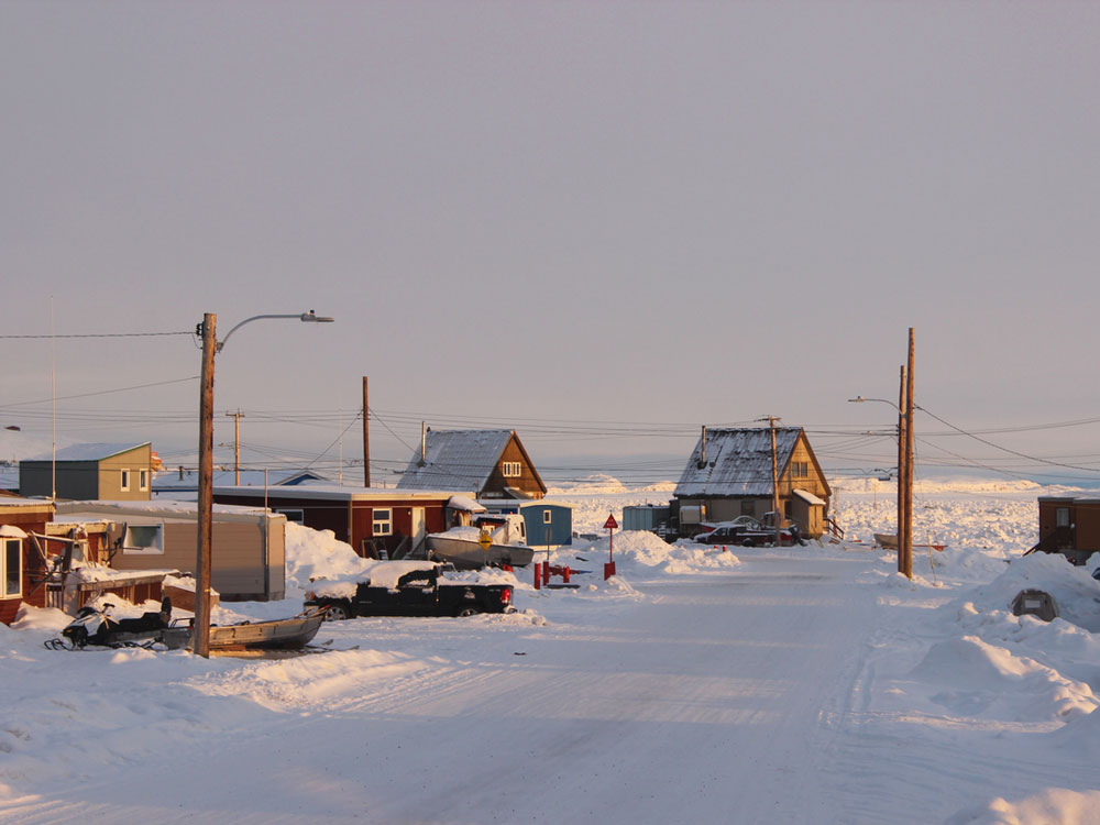 Cluster of snow-covered buildings in Iqaluit, Canada