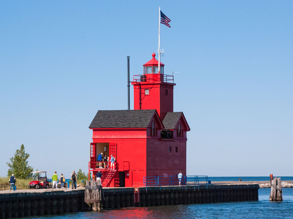 People visiting Historic Big Red Lighthouse in Holland, Michigan