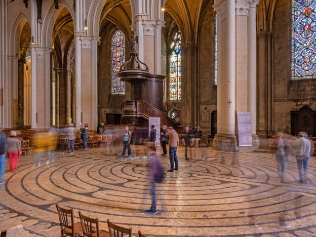 People standing in the Chartres Labyrinth inside Frances' Chartres Cathedral