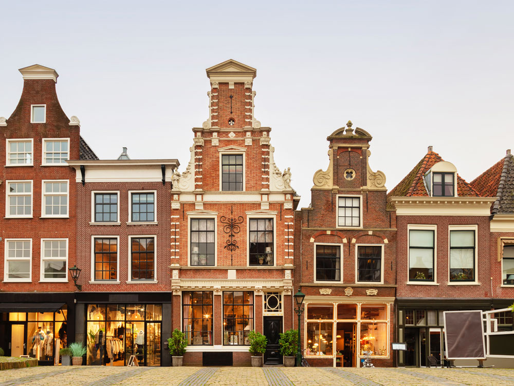 Traditional Dutch brick row homes in Alkmaar, the Netherlands
