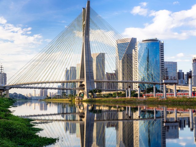 Modern suspension bridge and glass skyscrapers in Sao Paulo, Brazil