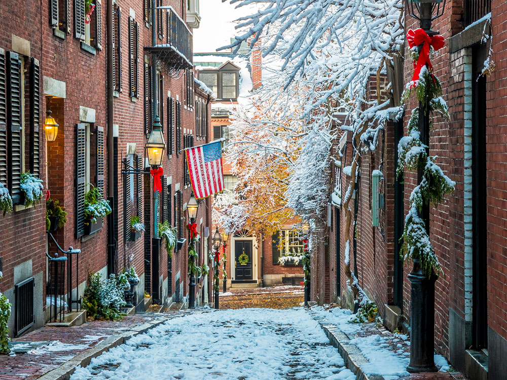 Snowy Boston street lined with brick buildings