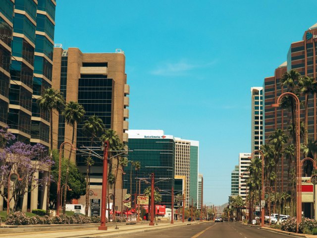 A picture of a downtown Phoenix streets under a blue sky
