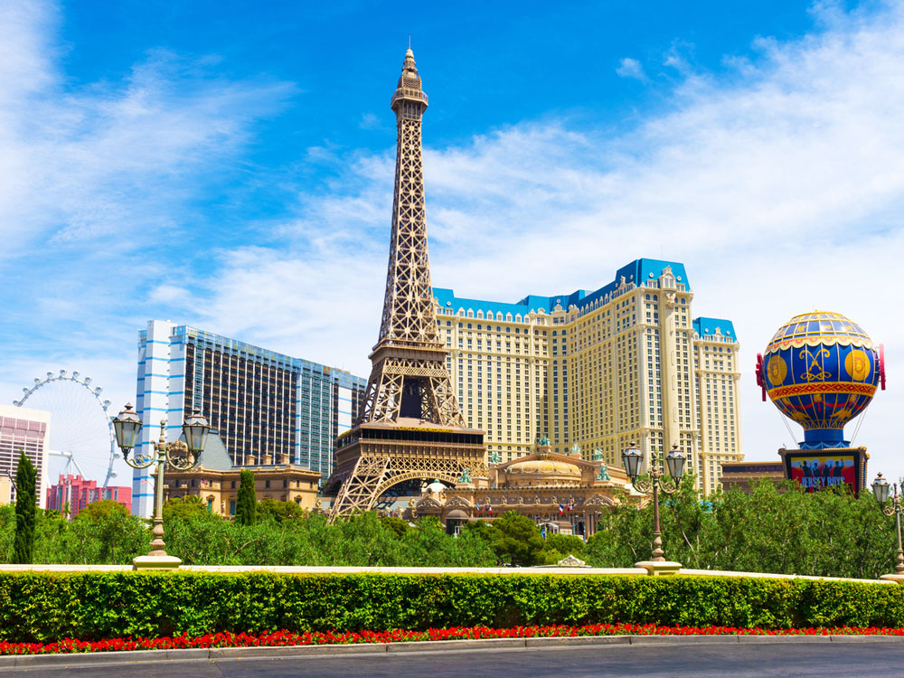 A picture of a miniature Eiffel Tower in front of a hotel in Las Vegas