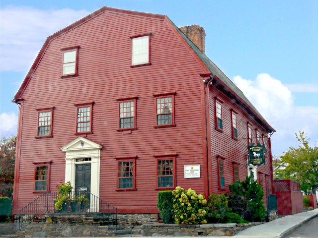 Red-clapboard exterior of the White Horse Tavern in Newport, Rhode Island