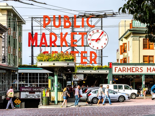 Iconic red sign for Pike Place Market in downtown Seattle, Washington