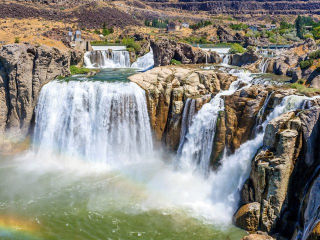 Aerial view of Shoshone Falls in Idaho forming a rainbow