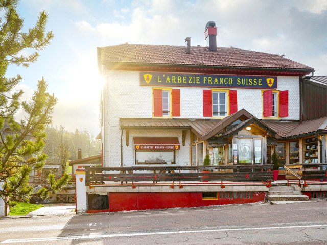 Exterior of Hotel L'Arbezie Franco Suisse along France-Switzerland border