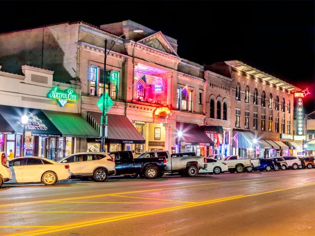 Historic Whiskey Row featuring restaurants and saloons in Prescott, Arizona, at night