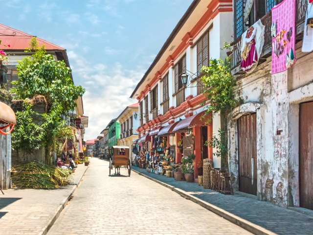Street lined with row homes in Vigan, Philippines