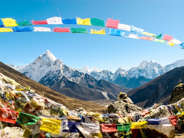 Colorful flags flying over Mount Everest