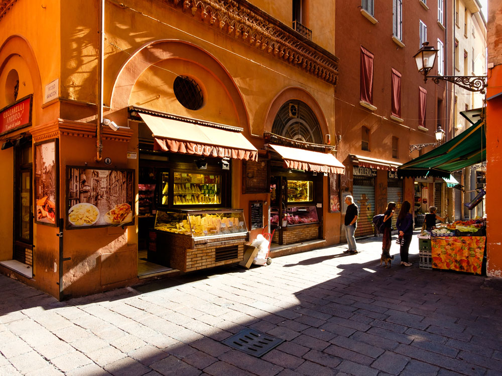 Vendors selling food at the Quadrilatero in Bologna, Italy
