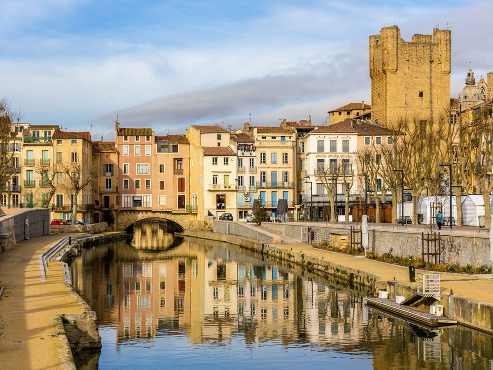 Canal and buildings in Narbonne, France