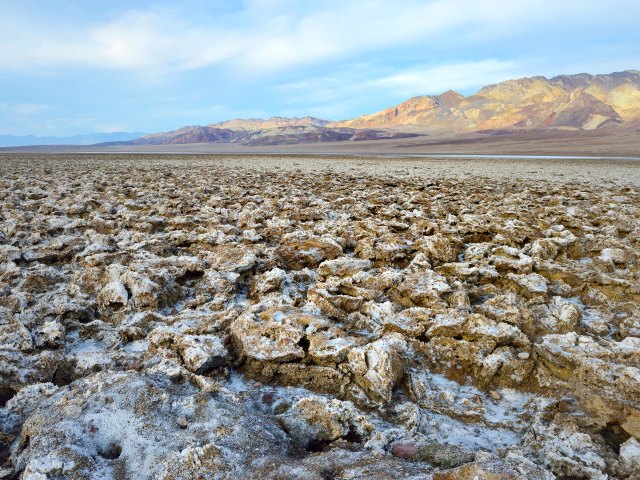 Overview of rocky landscape of Devil's Golf Course salt pan in Death Valley National Park, California