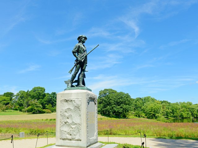 Statue of Revolutionary War soldier at Minute Man Historical Park in Massachusetts