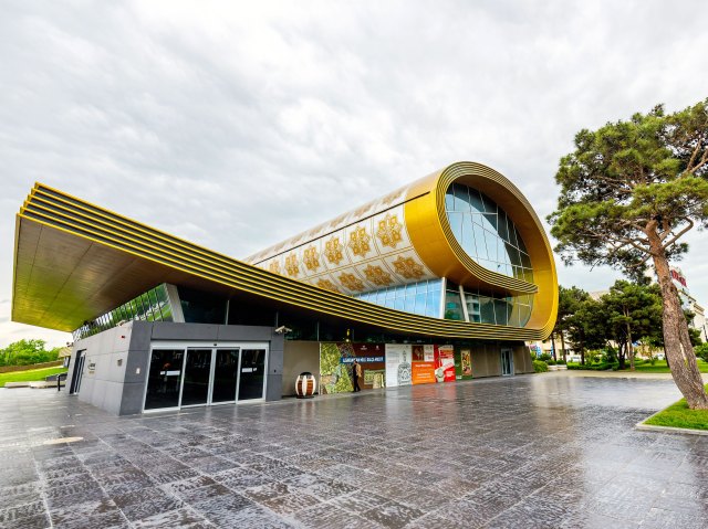 Azerbaijan National Carpet Museum building with roof modeled after rolled carpet