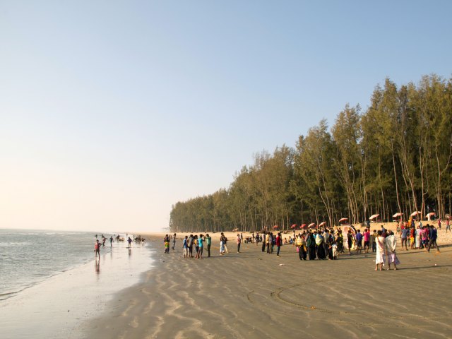 People gathered on Cox's Bazar Beach in Bangladesh