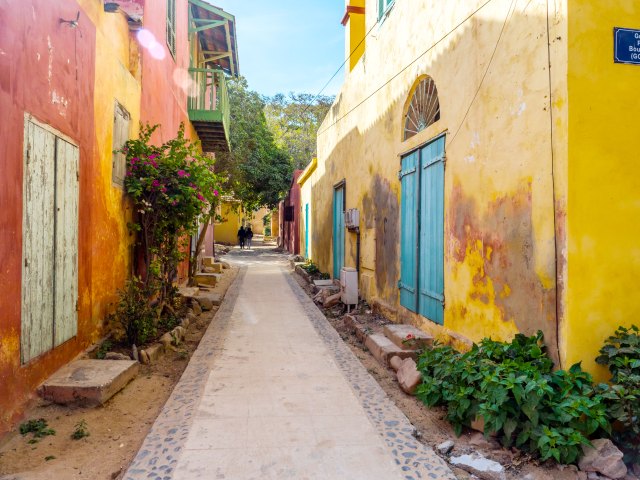 Narrow, colorful alleyway in Gorée, Senegal