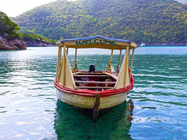 Boat off the lush coast of Haiti