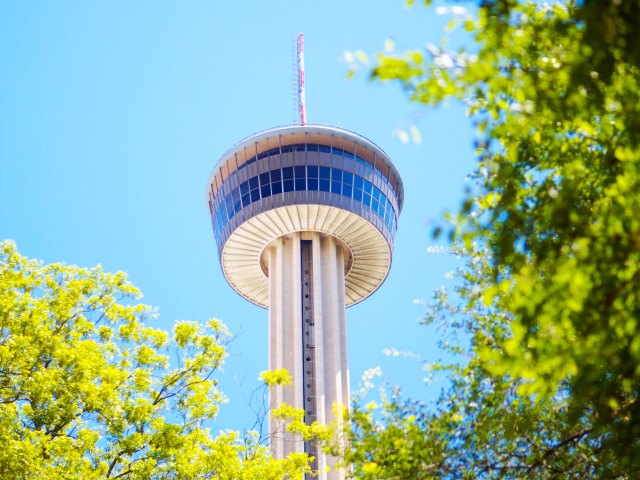 View of San Antonio's Tower of the Americas above treetops