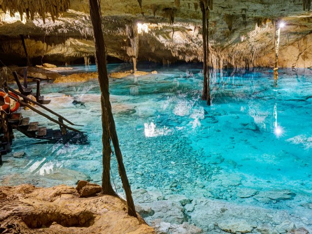 Crystalline waters inside the Cenote Taak Bi Ha in Mexico