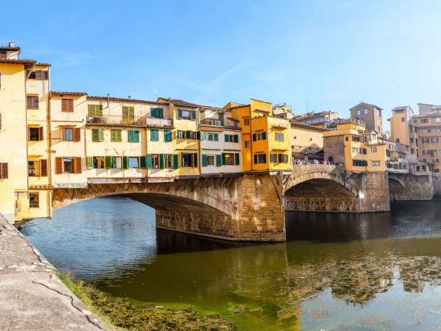 Multi-story shops liking the Ponte Vecchio in Florence, Italy