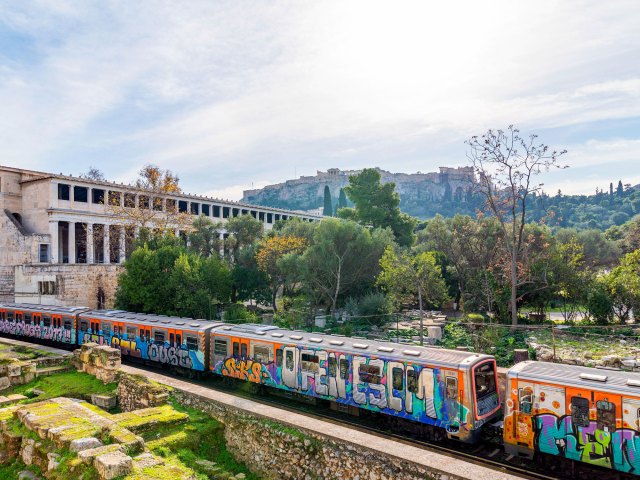 View of graffiti-covered metro in Athens, Greece