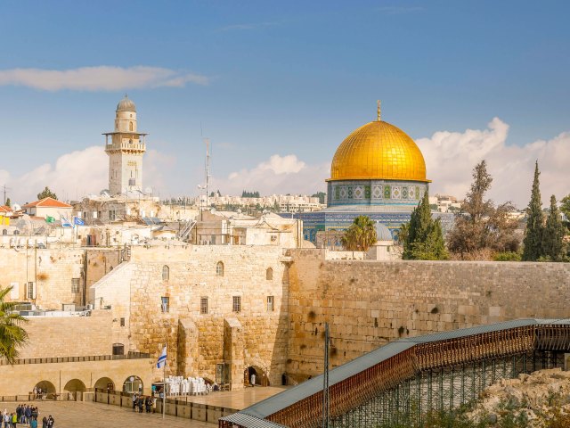 Western Wall and gold-domed church in Jerusalem, Israel
