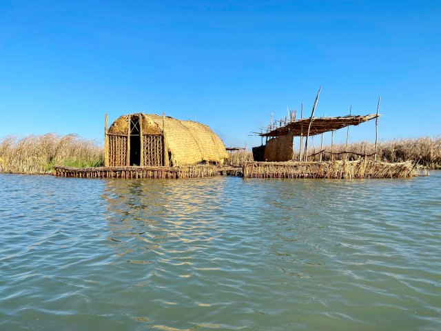 Traditional structures lining the Mesopotamian Marshes