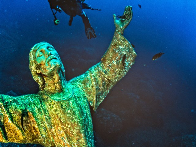 Underwater statue of "Christ of the Abyss" off the Italian Riviera