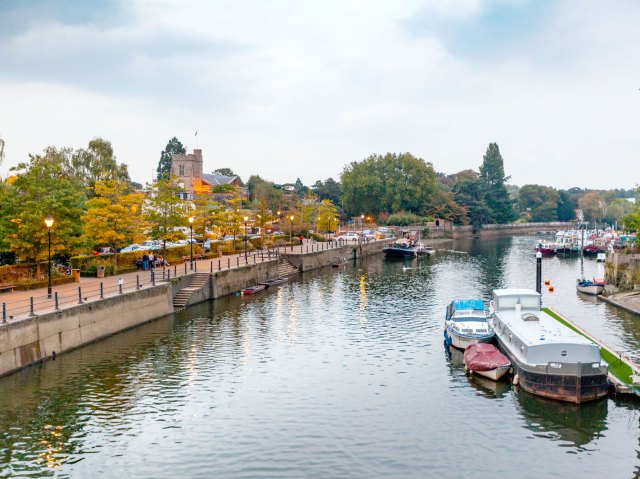 Boats docked in River Thames next to Eel Pie Island in London