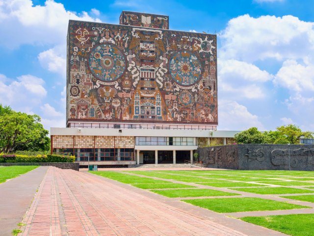 Massive exterior mural of the UNAM Central Library in Mexico City, Mexico