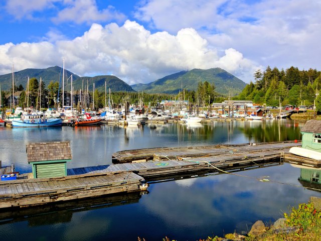 Marina of Ucluelet, British Columbia with mountains in background