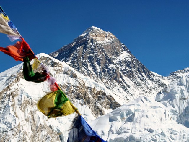 Flags flying over Mount Everest