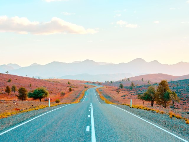 Empty two-lane stretch through mountains on Highway 1 in Australia