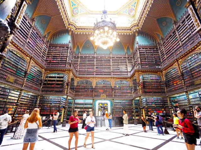 People inside the Royal Portuguese Reading Room in Rio de Janeiro, Brazil