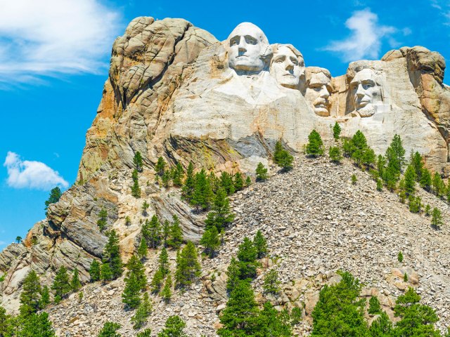 The rock-carved presidential faces of Mount Rushmore
