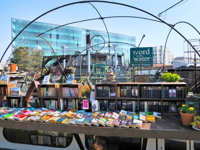 Books on display at the Word on the Water repurposed barge in London, England