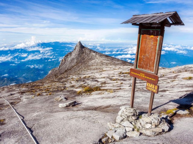 Sign on mountaintop on island of Borneo