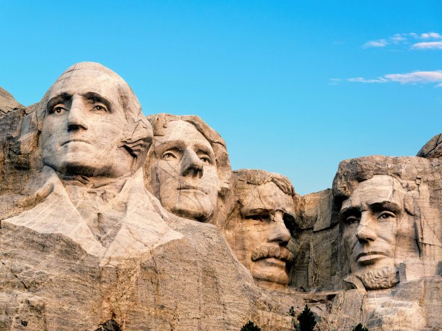 Four Presidential faces carved into rock of Mount Rushmore in South Dakota