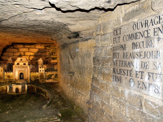 Signage in underground tunnel inside Catacombs of Paris