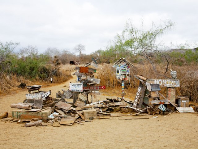 Image of makeshift mailboxes along Post Office Bay on Floreana Island, Ecuador